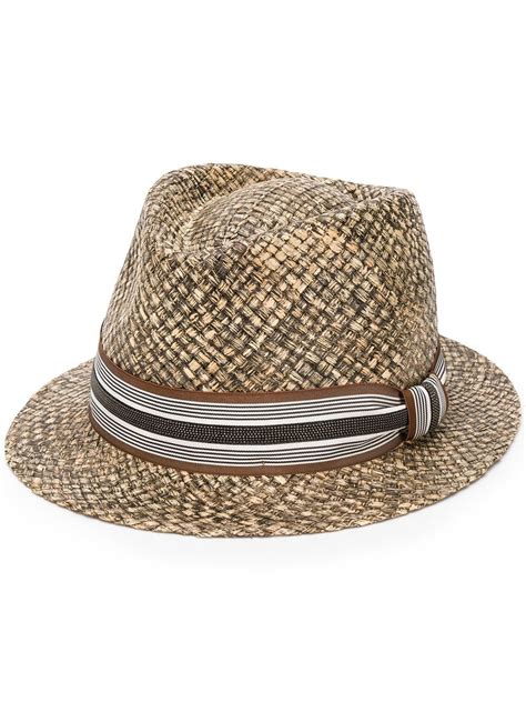 Raffia hat in neutrals .